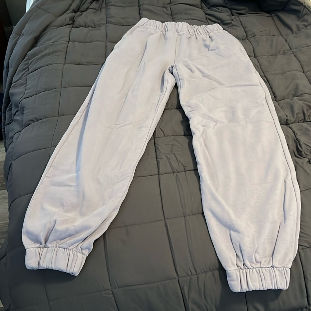 John Galt. Used but good condition. Lavender, small, has pockets